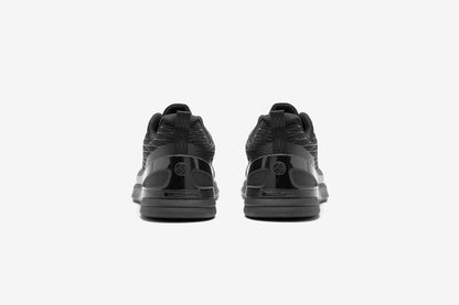 black sneakers shoes for training workout with a brand logo 