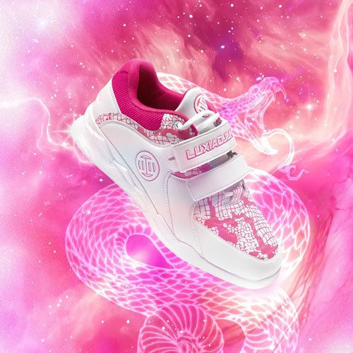 White and pink sneaker on a pink weightlifting shoes